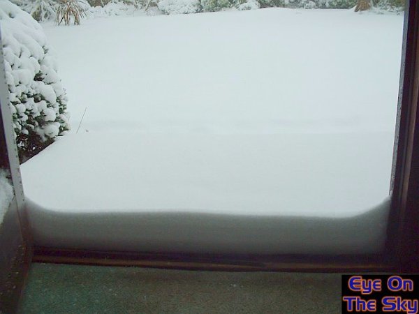 Snow against the front door