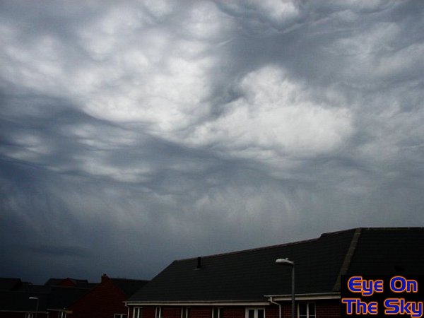 Spectcular, boiling thunderclouds and distant downdraft