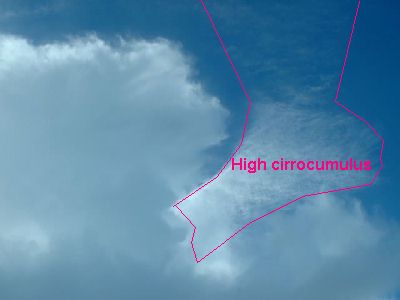 Cb developing into region of cirrocumulus