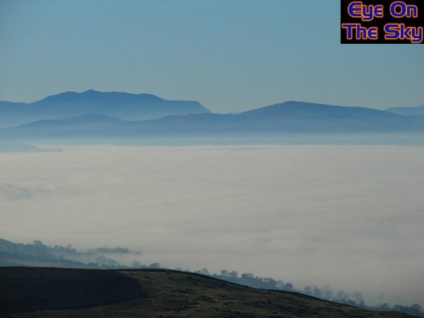 A foggy valley, looking towards Snowdonia